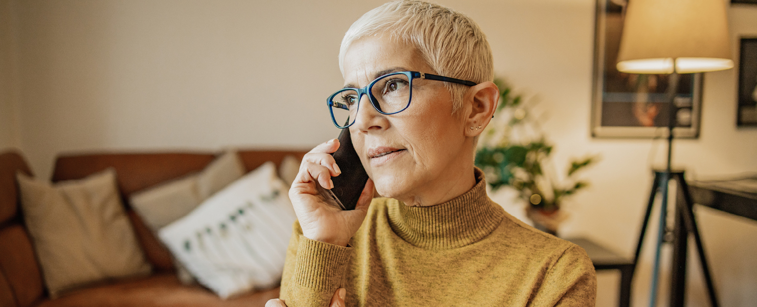 a woman on her phone at home