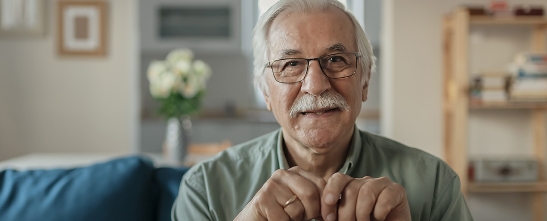 Elderly man smiling
