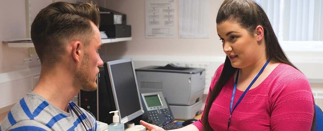 GP talking to patient