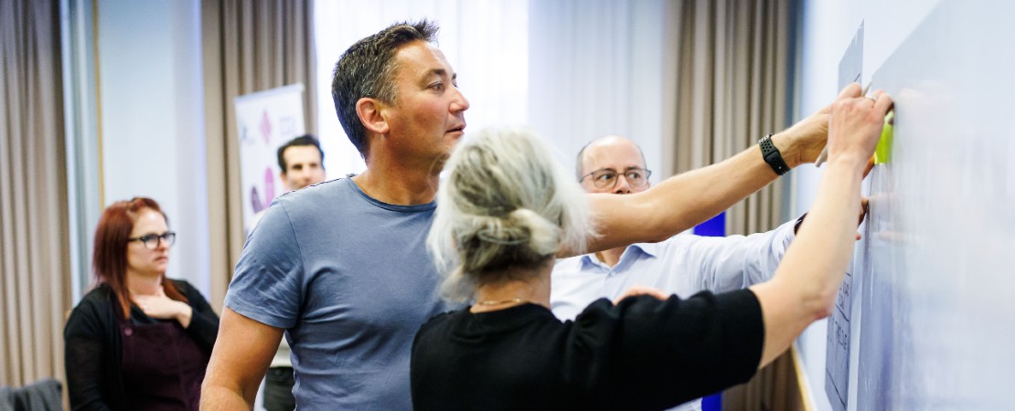 colleagues taking part in a workplace activity