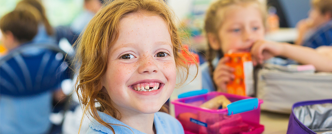 schoolchild smiling