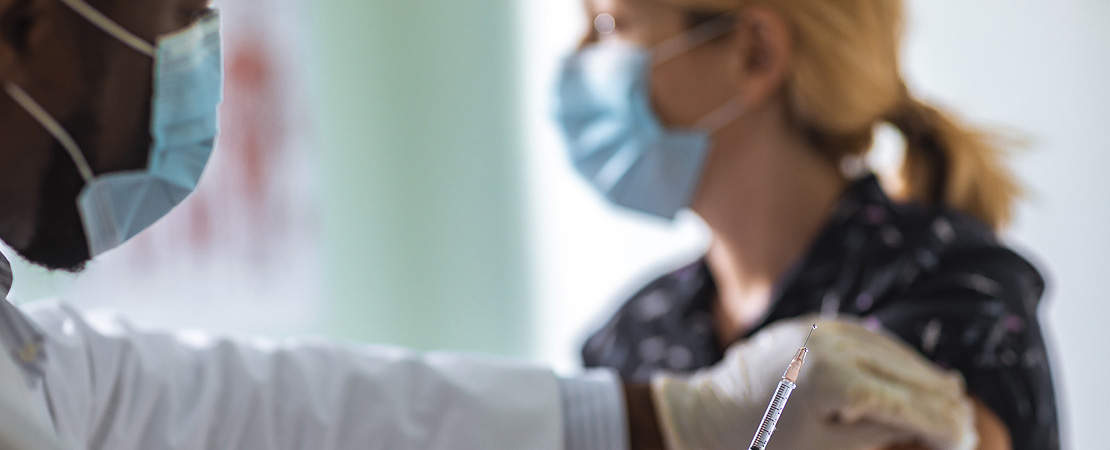 Woman being vaccinated