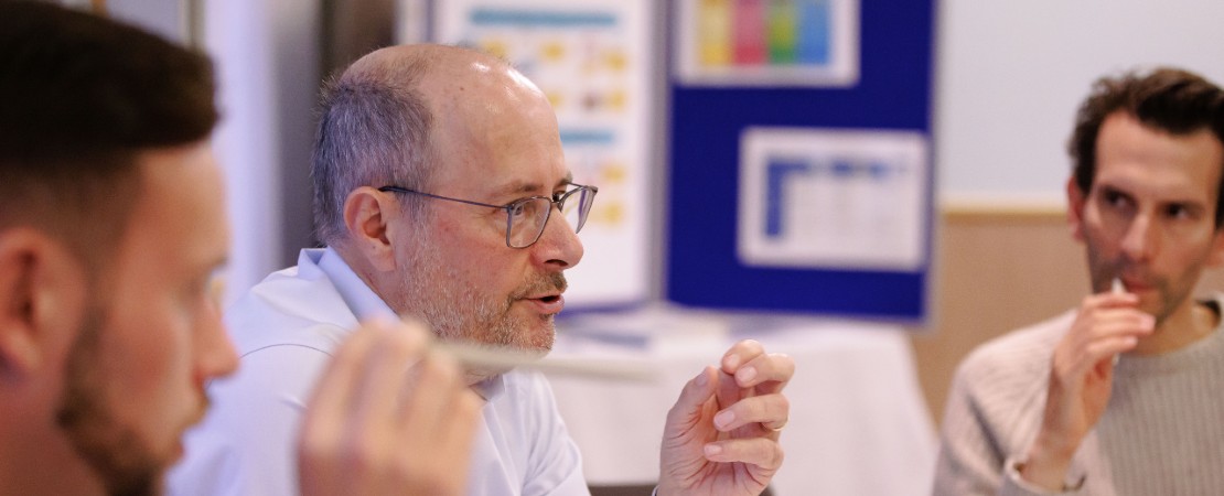 Three colleagues in discussion