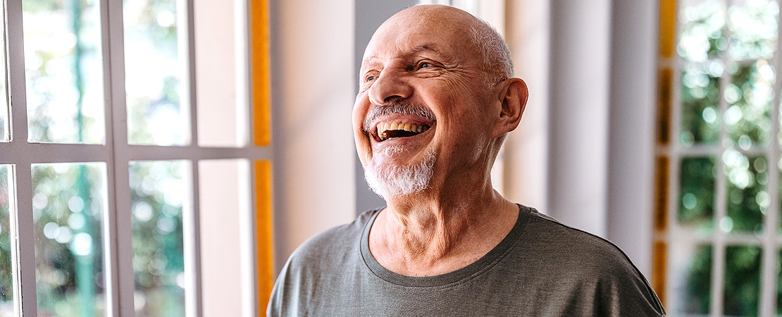 Older man laughing