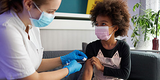 Child being vaccinated