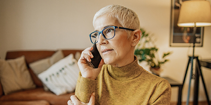 a woman on her phone at home