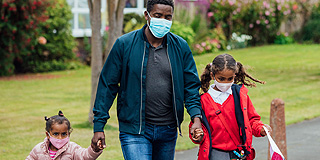Family wearing masks