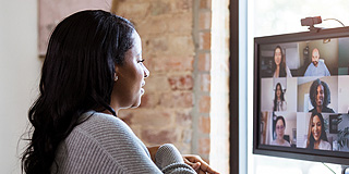 female worker looking at screen
