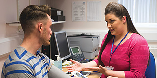 GP talking to patient