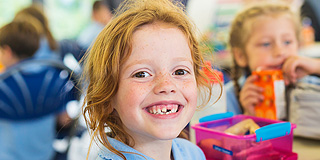 School child smiling