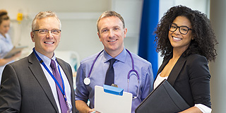 Three NHS colleagues in a hospital