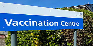 NHS sign saying 'vaccination centre'