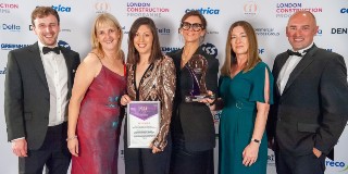 SCW colleagues with award