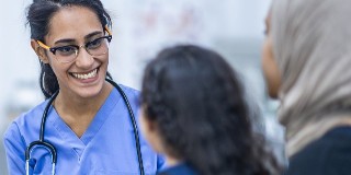 nurse and patient with headscarf