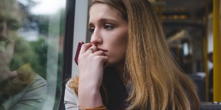 woman looking glum