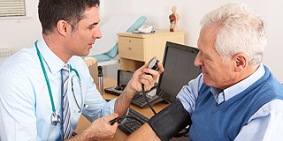 doctor with elderly patient