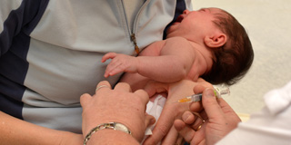 Baby being vaccinated