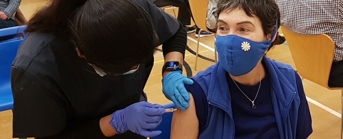 lady being vaccinated